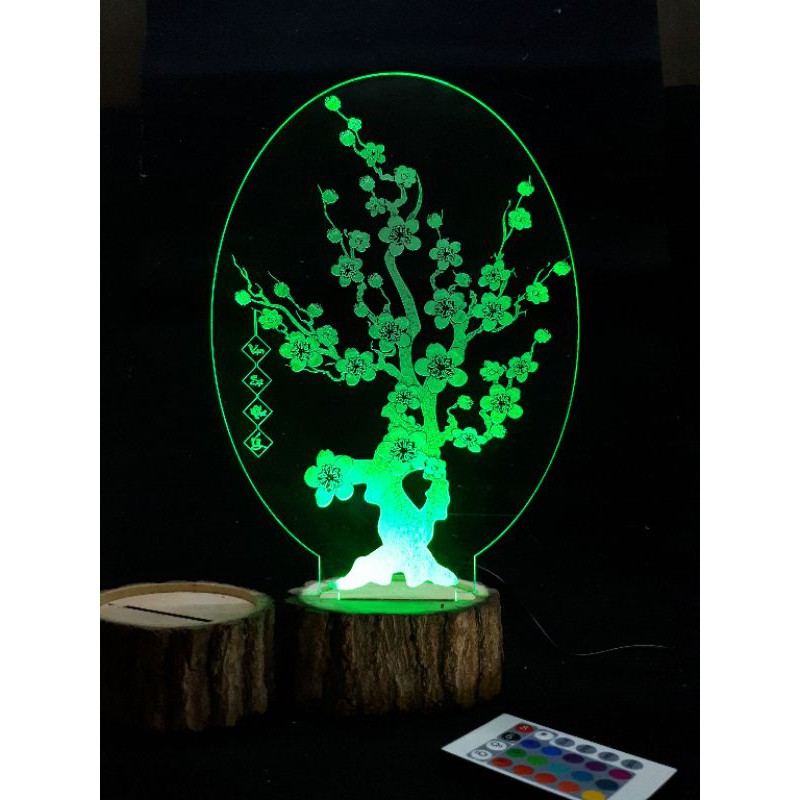 Đèn led cây Mai đế gỗ vỏ tròn.
