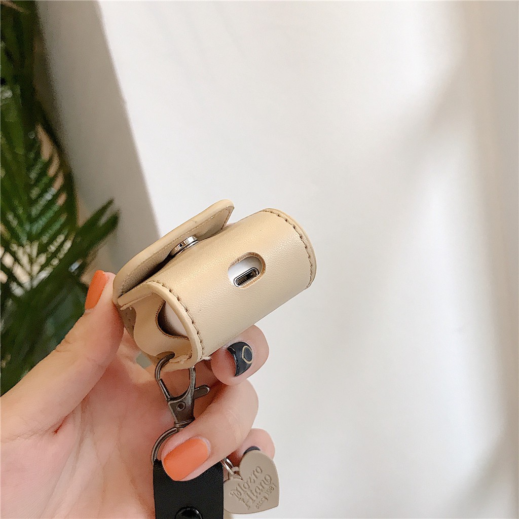 Vỏ bảo vệ hộp sạc tai nghe AirPods Pro AirPods 1 AirPods 2 bằng da kèm móc khóa