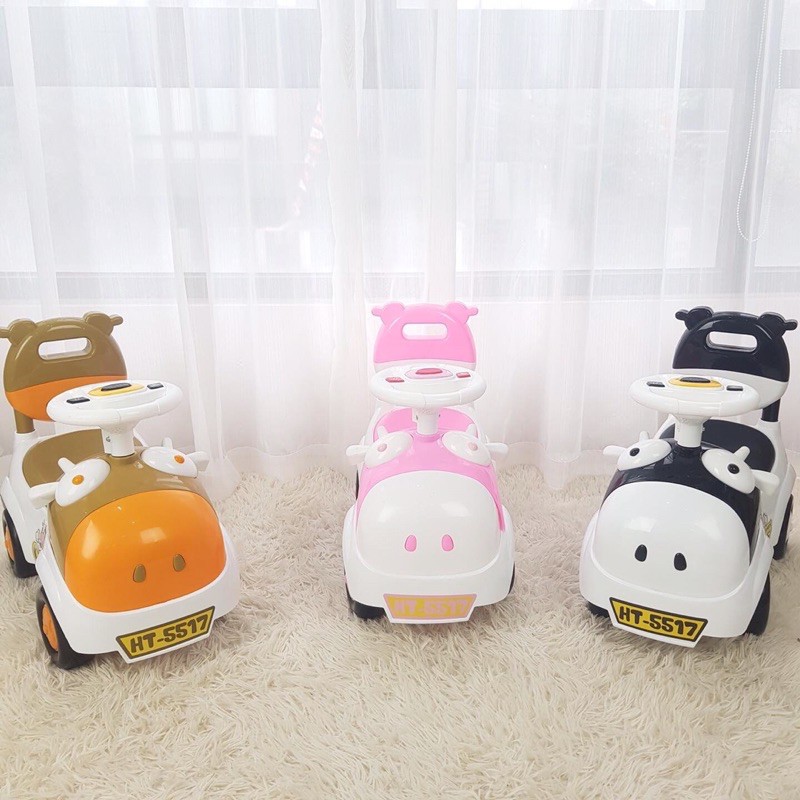 Xe chòi chân kiêm bám tập đi cho bé Toyshouse có nhạc và khoang đựng đồ (hình cá heo - bò sữa - robot)