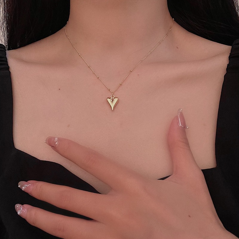 Dây chuyền nữ mặt trái tim kéo dài đính bi tròn Trang Sức SG