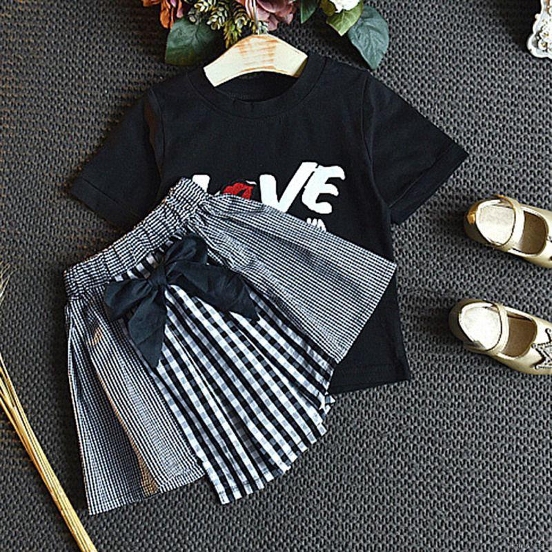 Bộ áo thun ngắn tay + chân váy nơ cho bé gái