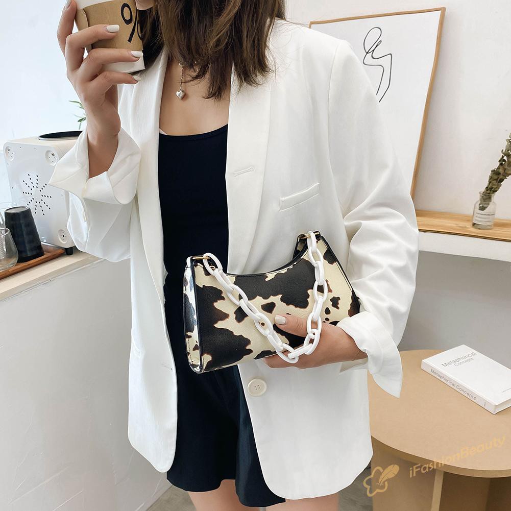 Túi xách da PU kẹp nách hoạ tiết bò | BigBuy360 - bigbuy360.vn