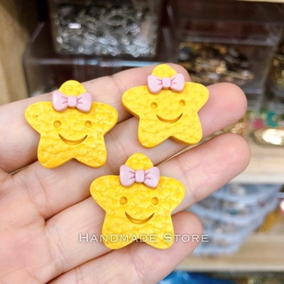 Charm sao vàng đeo nơ
