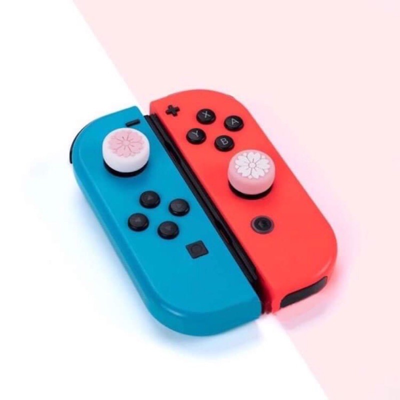 Bộ 4 núm bọc analog hình Sakura thương hiệu cao cấp Geekshare cho Joy-Con - Nintendo Switch và Nintendo Switch Lite