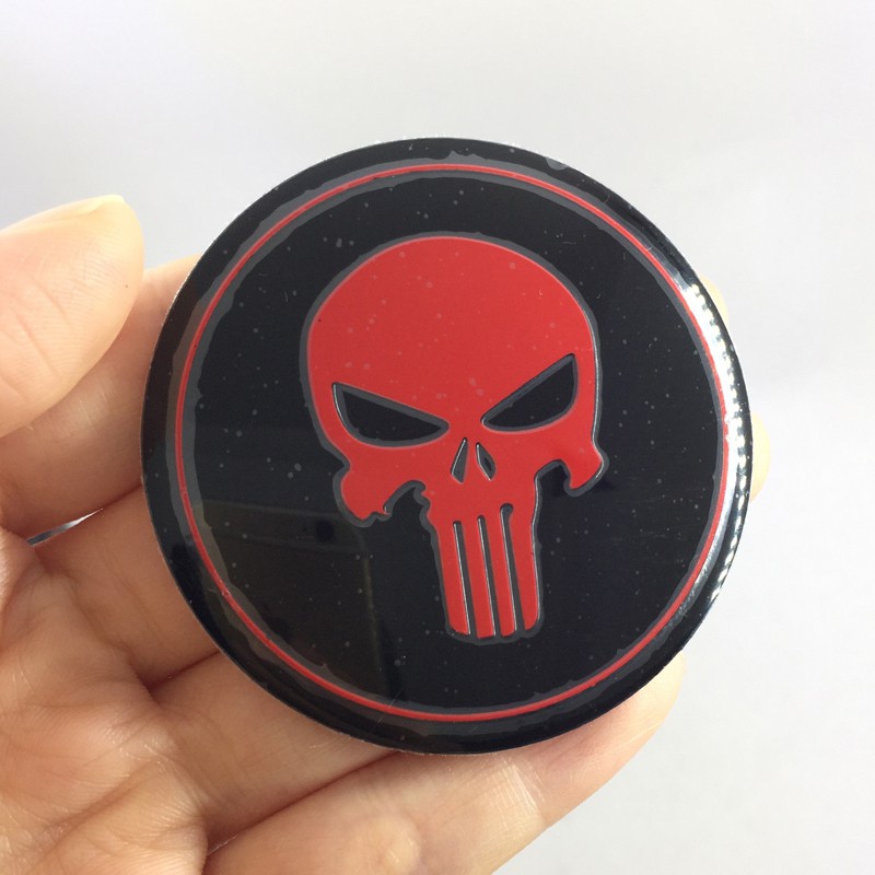 Bộ 4 miếng dán nắp giữa lốp xe hơi họa tiết đầu lâu 56mm