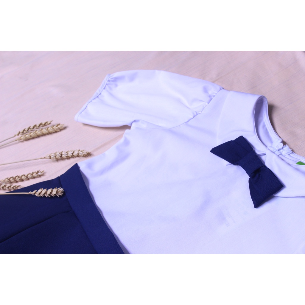 Đầm học sinh nữ cổ sen đính nơ ngực cho bé ngoại cỡ Jadiny