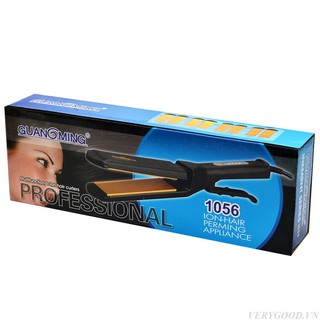 Máy duỗi dập xù tóc Guangming 1056