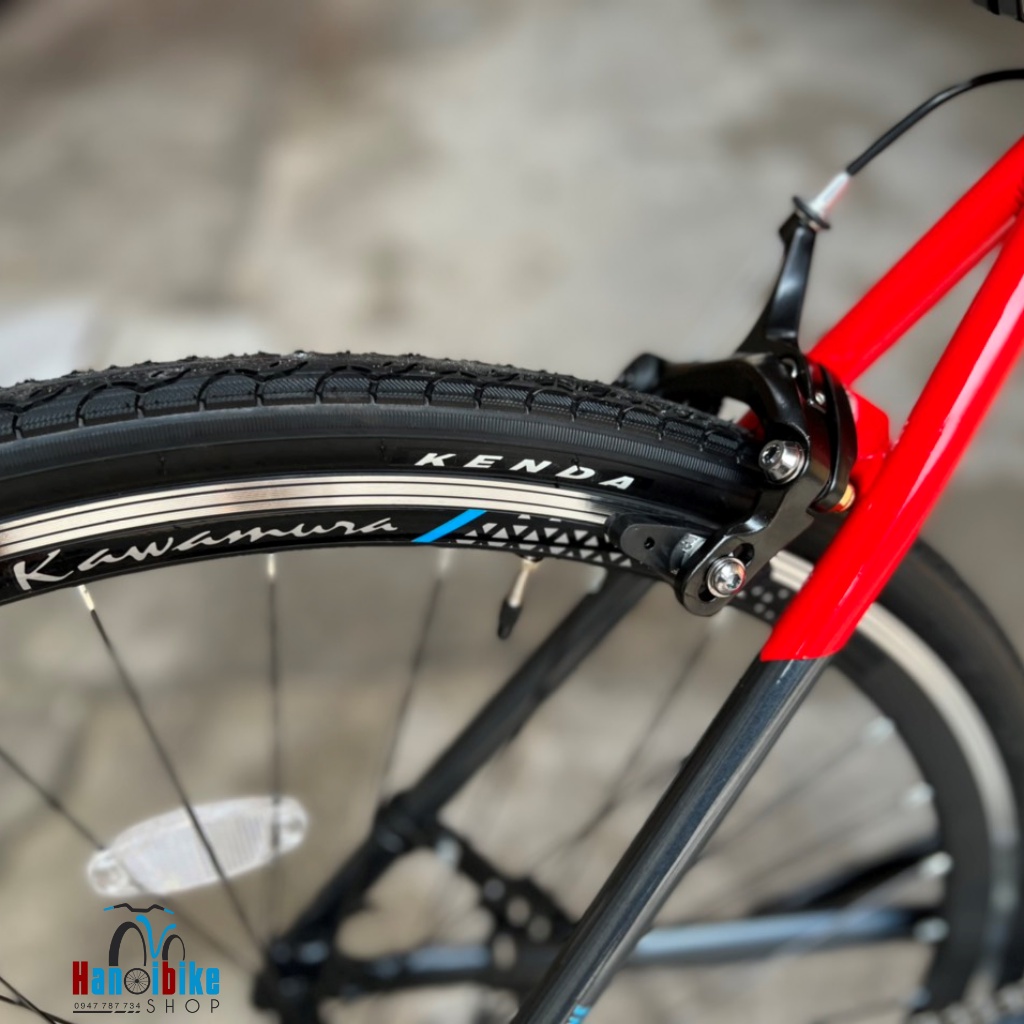 Xe đạp thể thao touring Kawamura Sanyo 3 màu Đen cam
