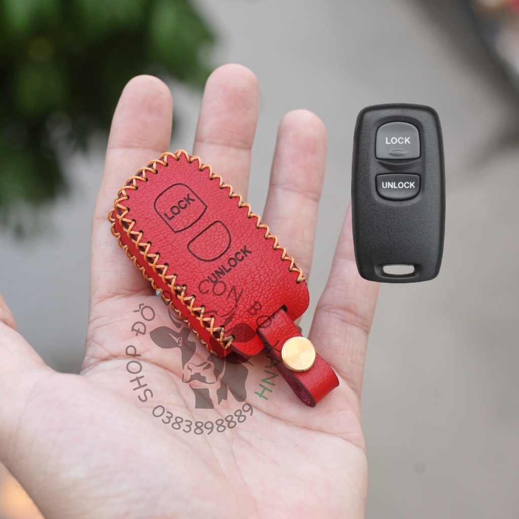 Bao da chìa khoá Ford Everest 2009 loại 2 phím bấm handmade da thật 008