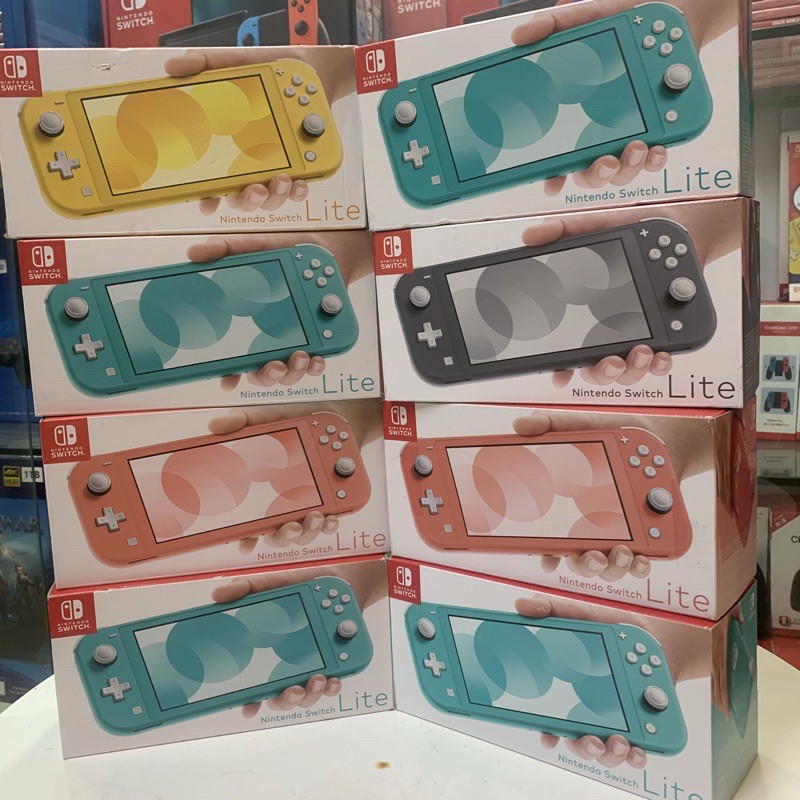 Máy Chơi Game Nintendo Switch Lite Màu - Xanh ,Xám , vàng ,hồng