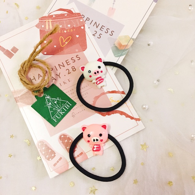 CỘT TÓC BÉ HEO ĐÁNG YÊU ẢNH THẬT