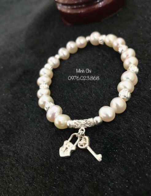 Vòng tay trai nuôi phối charm bạc