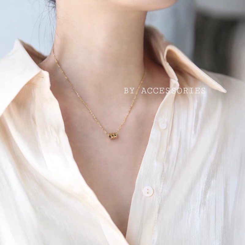 Dây chuyền titan mặt trụ nhỏ viền chéo không gỉ