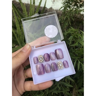 Móng giả thiết kế tím mắt mèo kc