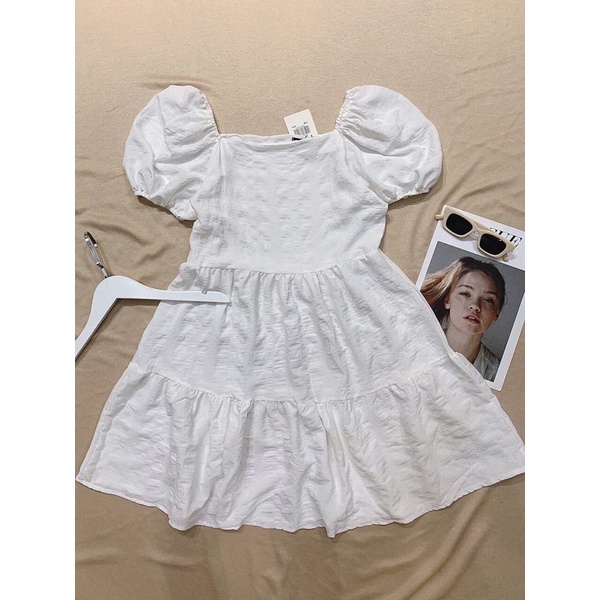 Đầm babydoll trắng xô gãy cổ vuông tay bồng siêu dễ thương