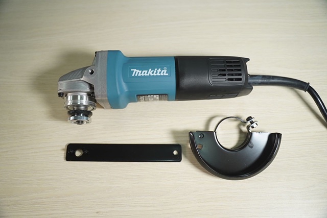 9553B Mái mài góc 100mm 710w Makita ( Công tắc đuôi )