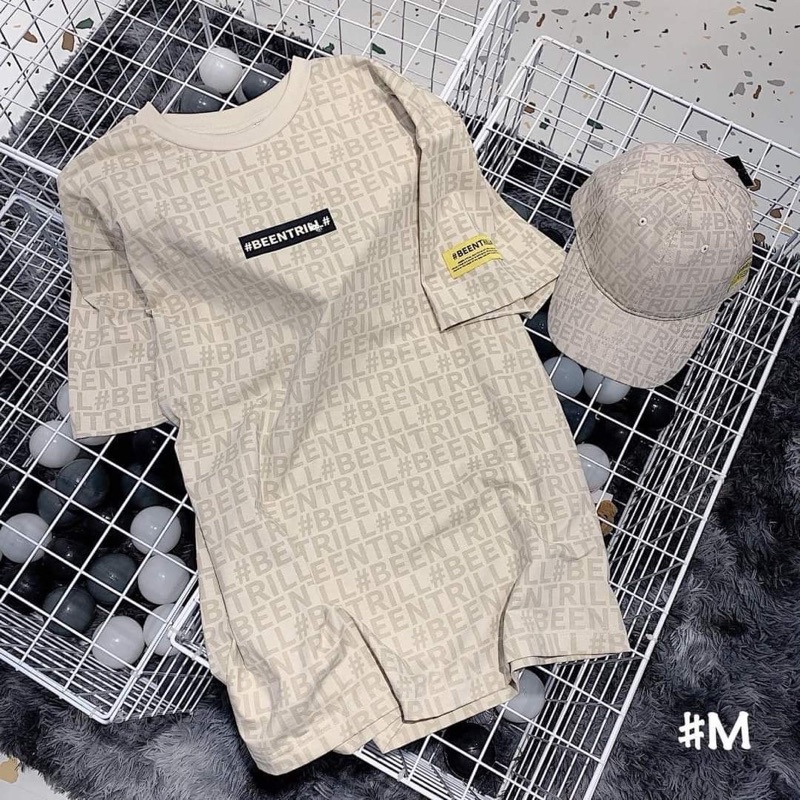 Áo phông thụng chữ logo tay vàng