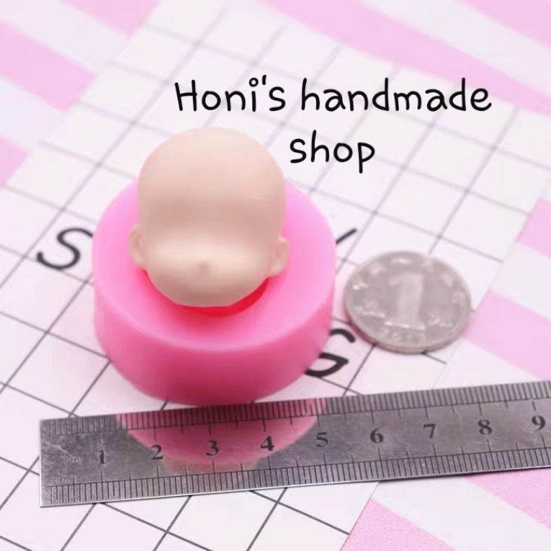 Khuôn silicon mặt búp bê hồng có tai