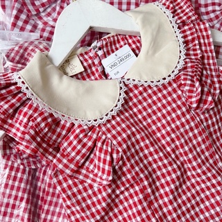 Váy kẻ caro đỏ bé gái