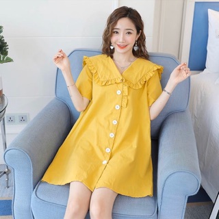 Đầm vàng cổ bèo nút trắng