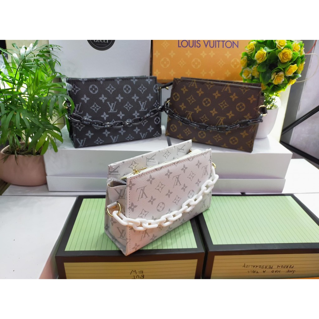 Clutch cầm tay dây xích