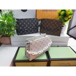 Clutch cầm tay dây xích