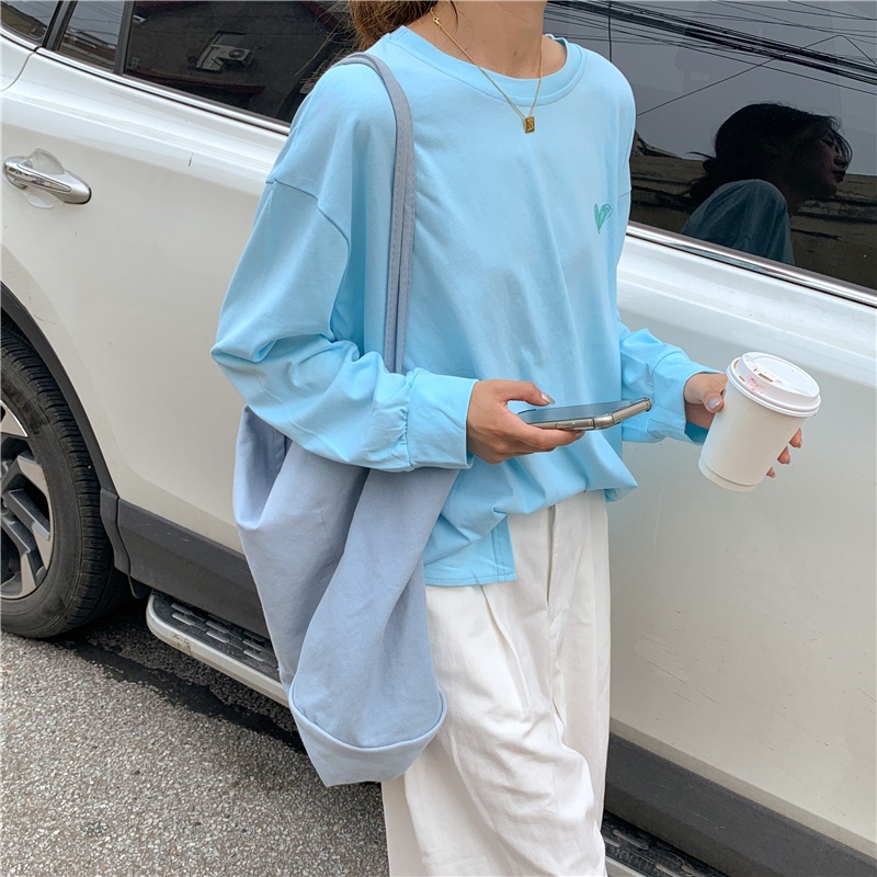 Áo thun nữ SUXI dài tay cổ tròn in chữ thời trang