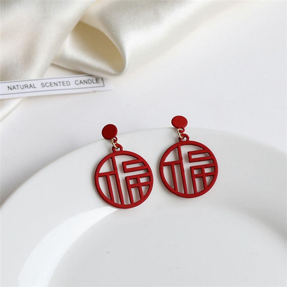 Bông Tai Mừng Năm Mới Thiết Kế Ngọt Ngào Cho Nữ