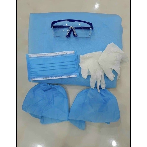 Bộ đồ bảo hộ xanh 7 món .