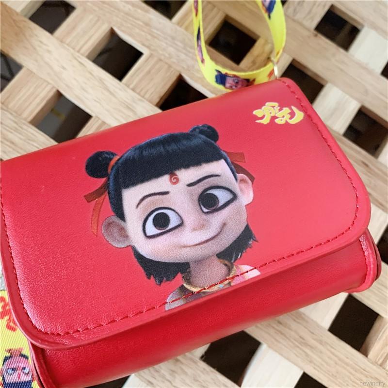 Túi đeo chéo làm từ da PU với họa tiết hoạt hình