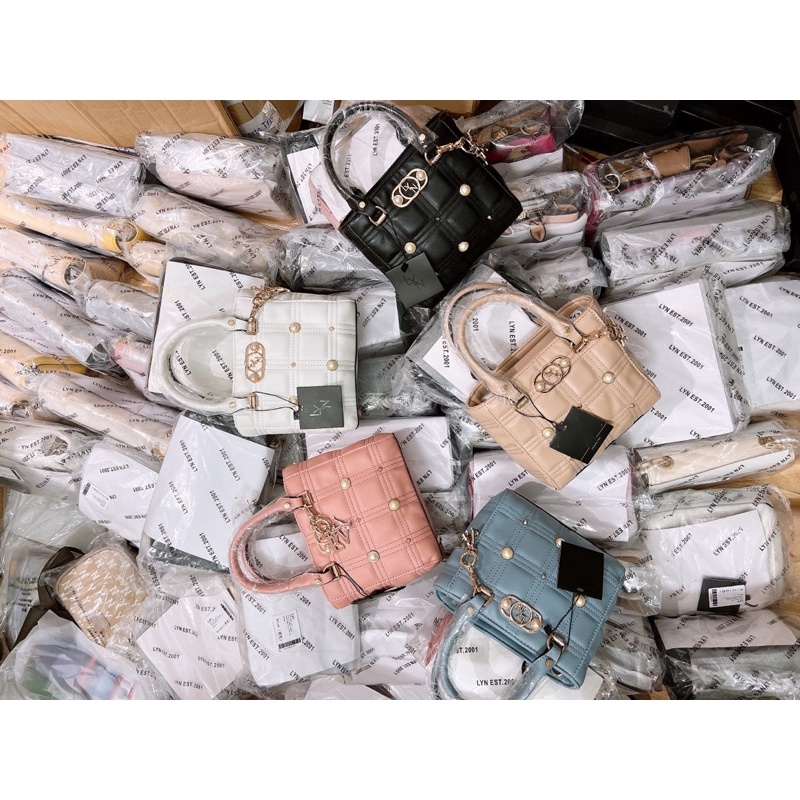 Túi lyn tay cầm dáng lady