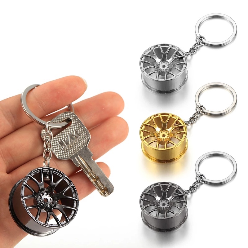 Móc khóa kim loại màu đen mini giảm xóc cho xe hơi