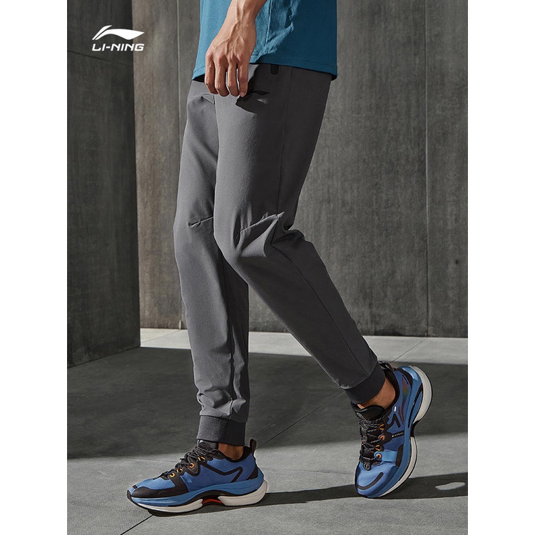 Quần Gió Thể Thao LINING Nam AYKS535 Chính Hãng