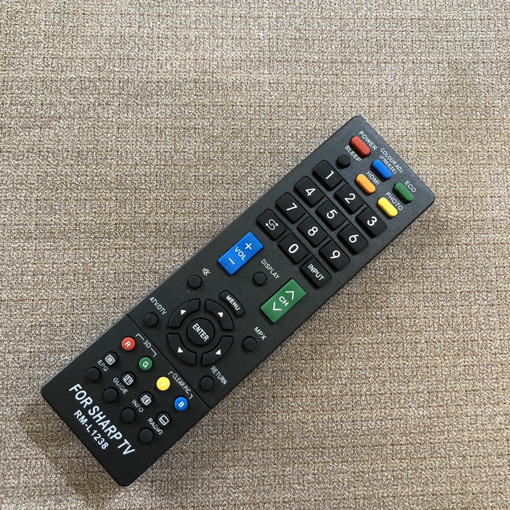 Điều khiển tivi SHARP TV RM-L1238 đa năng - Dùng được cho các tivi sharp hiện nay - Tặng kèm pin và bảo hành 3 tháng