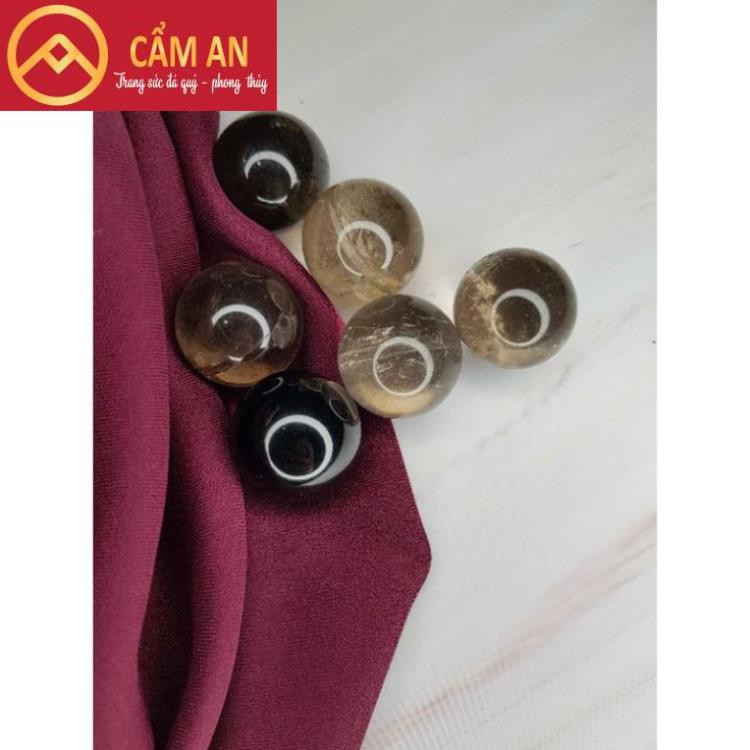 Quả cầu đá thanh tẩy tự nhiên màu vàng khói  kích thước~ 2,5cm nhỏ gọn dễ mang đi.
