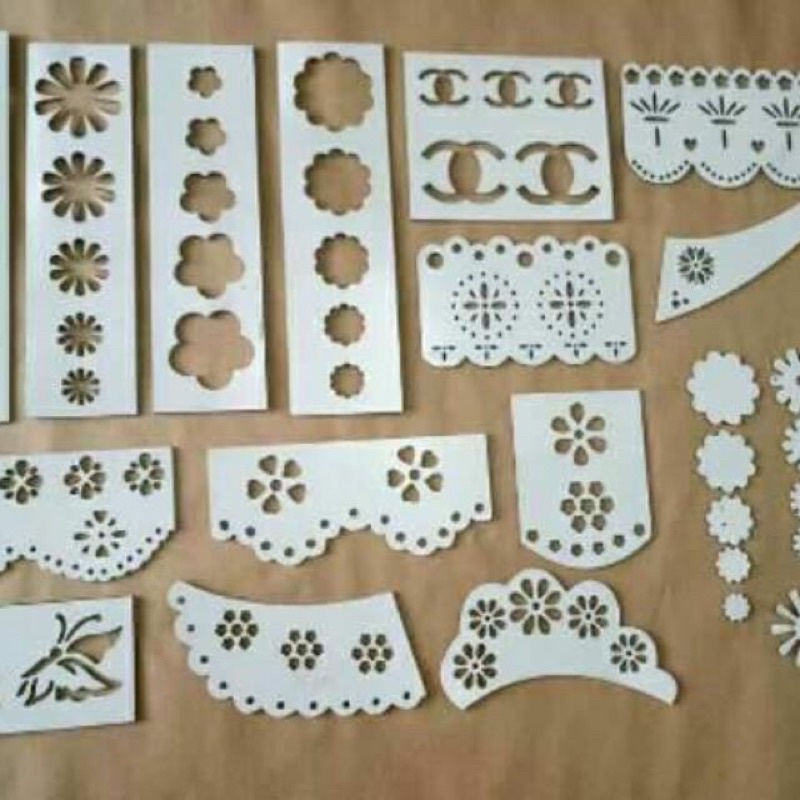 bộ khuôn cắt tỉa hoa văn trên váy áo