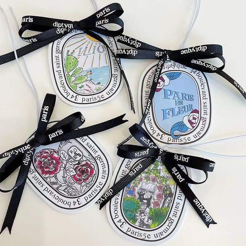 Lá thơm treo xe khử mùi xe hơi