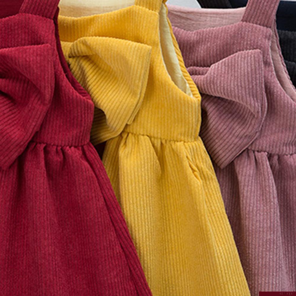 Đầm xòe 2 dây vải nhung đính nơ dễ thương cho bé gái 2-8 tuổi