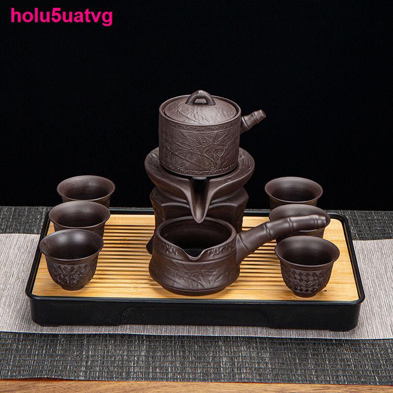 Áo lótBộ ấm trà Zisha lười bán tự động xoay graphite uống gốm sứ Kung Fu Tea Set gia dụng
