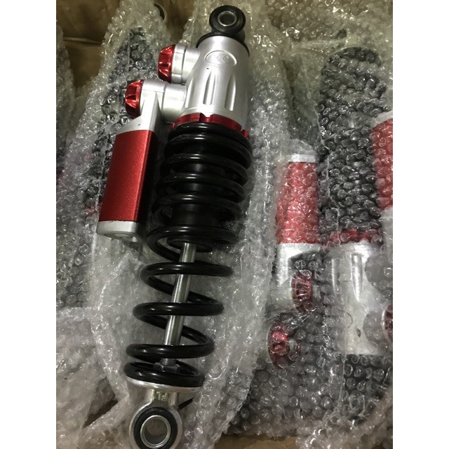 Giảm Sóc sau xe điện 133S
