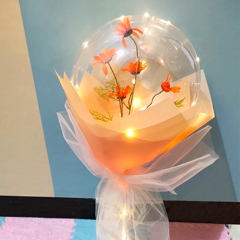 Bó hoa cúc giả trong suốt có đèn LED dùng làm quà tặng cho bạn gái