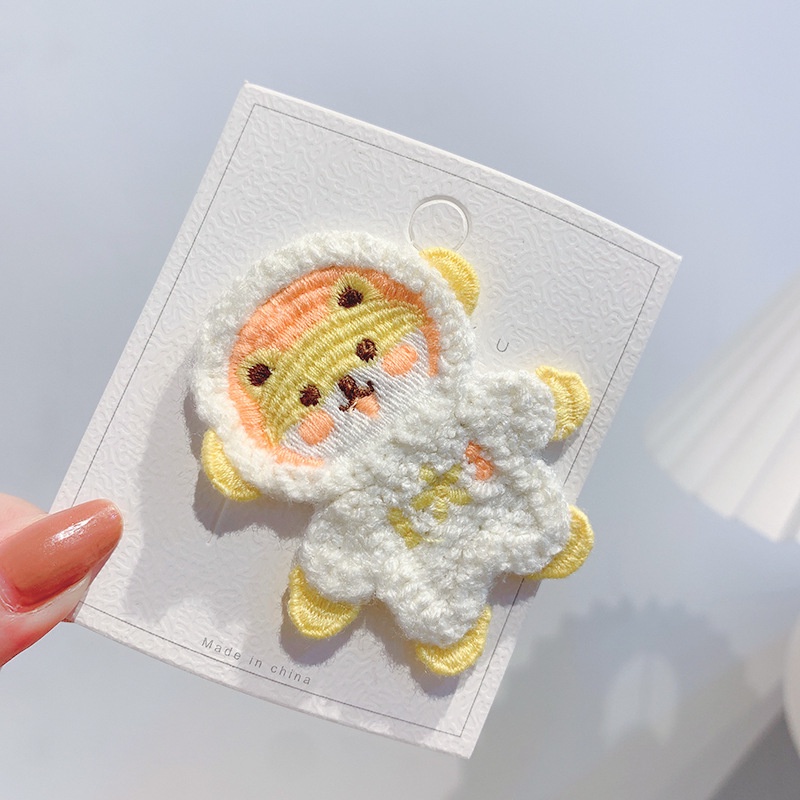 Kẹp tóc hình phi hành gia nhồi bông kiểu dáng dễ thương