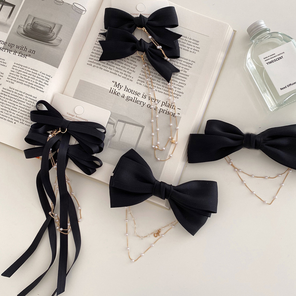 Kẹp tóc gắn hình nơ đáng yêu cho nữ