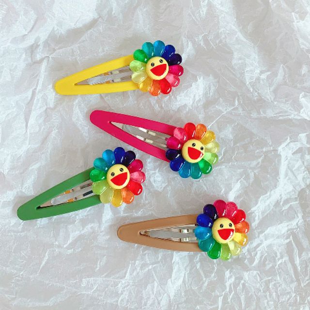 Kẹp tóc bấm hoa mặt trời kaikai kiki(chọn màu ib)