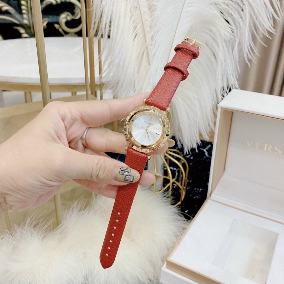 Đồng hồ nữ Michael Kors Dây da mặt xoay độc đáo