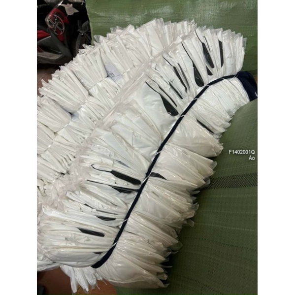 Áo sơ mi trắng ngực phối hình trái tim đen tay dài gài nút 1402