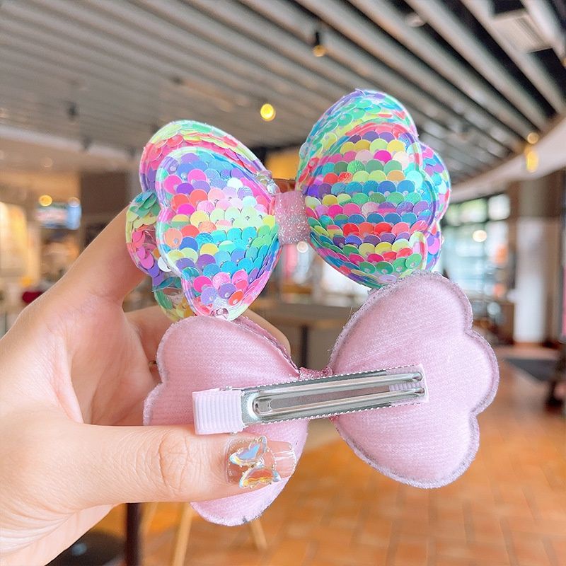 Kẹp tóc nơ đính kim sa xinh xắn cho bé