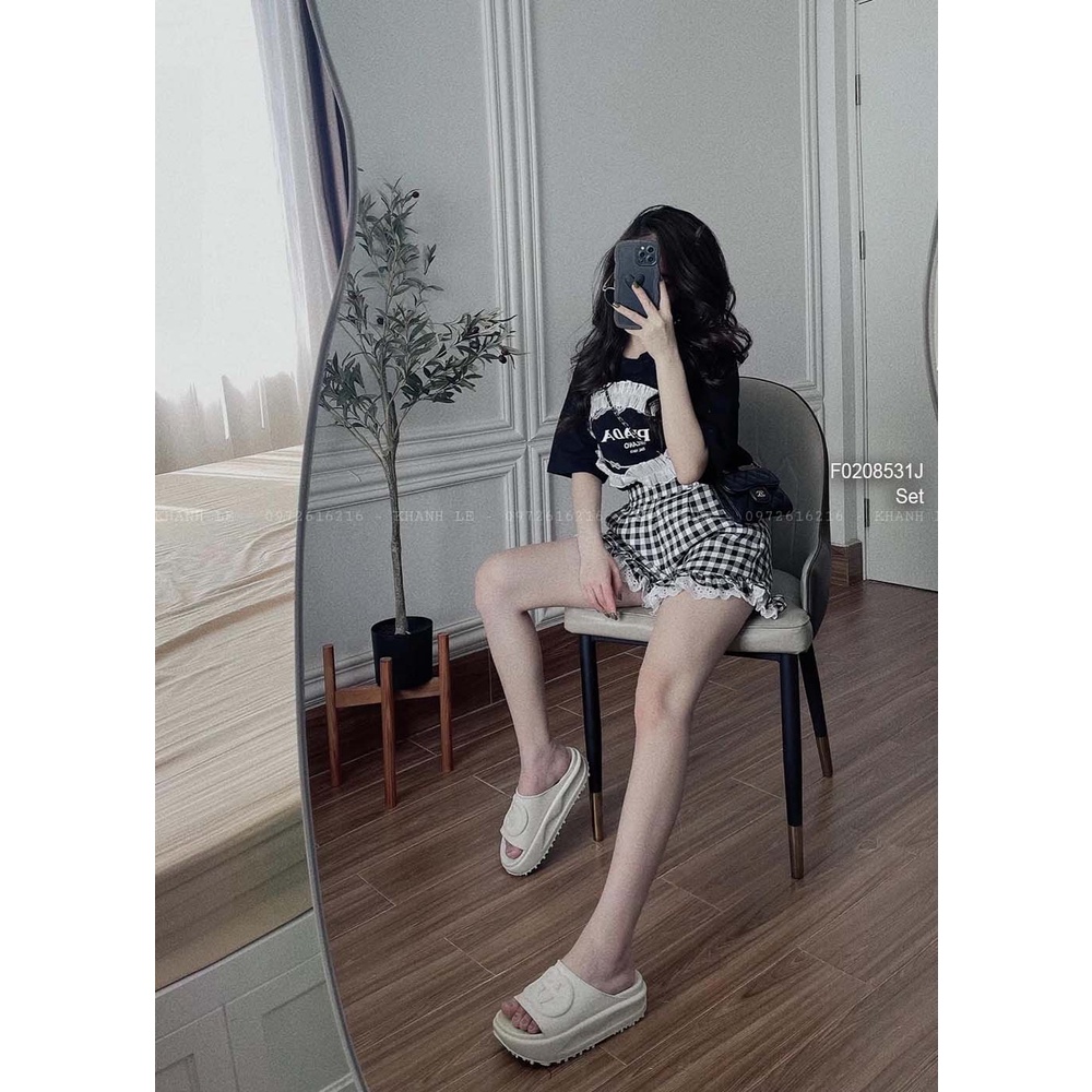 Set bộ áo thun đen phối viền bèo nổi tay con kèm quần short caro lai bèo!