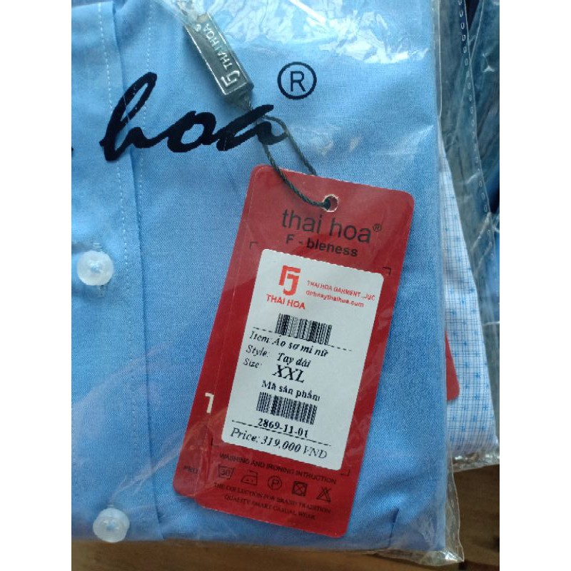 Áo sơ mi nữ Thái Hoà màu xanh dương vải sợi tre.