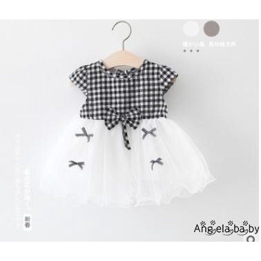 Đầm xòe kẻ sọc ca rô đính nơ cho bé